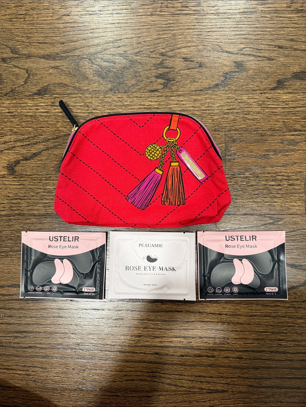 Estée Lauder Red Tassel Cosmetic Pouch and 3 rose eye masks
